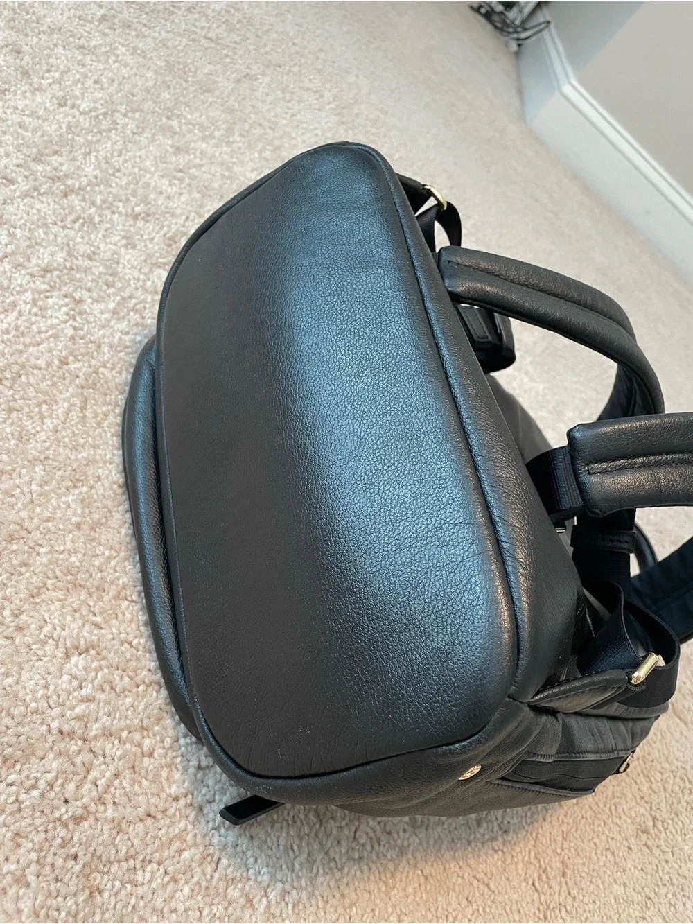 Tumi Black Leather Backpack with Goldtone Hardware